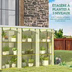 Serre de balcon blanche avec plantes sur neuf tablettes en trois colonnes