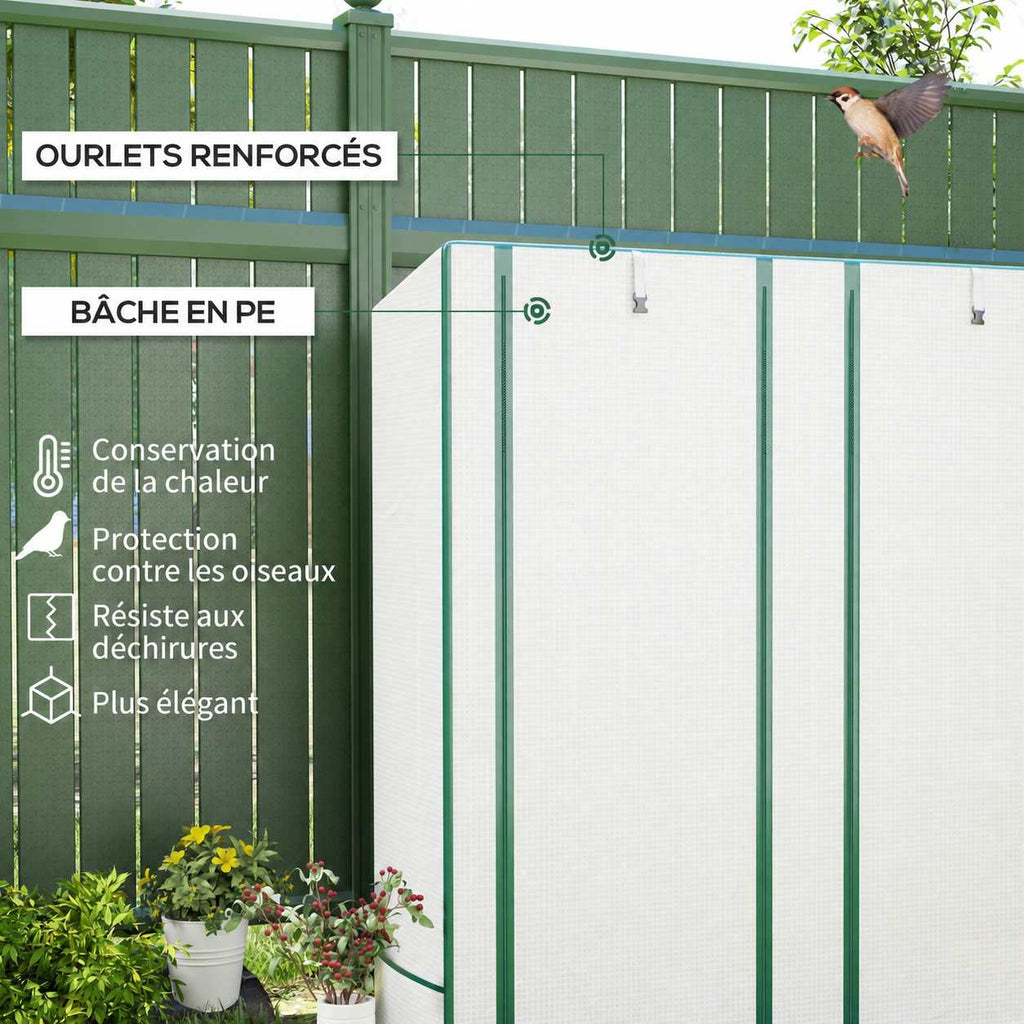 Serre blanche fermée avec bordures vertes et œillets