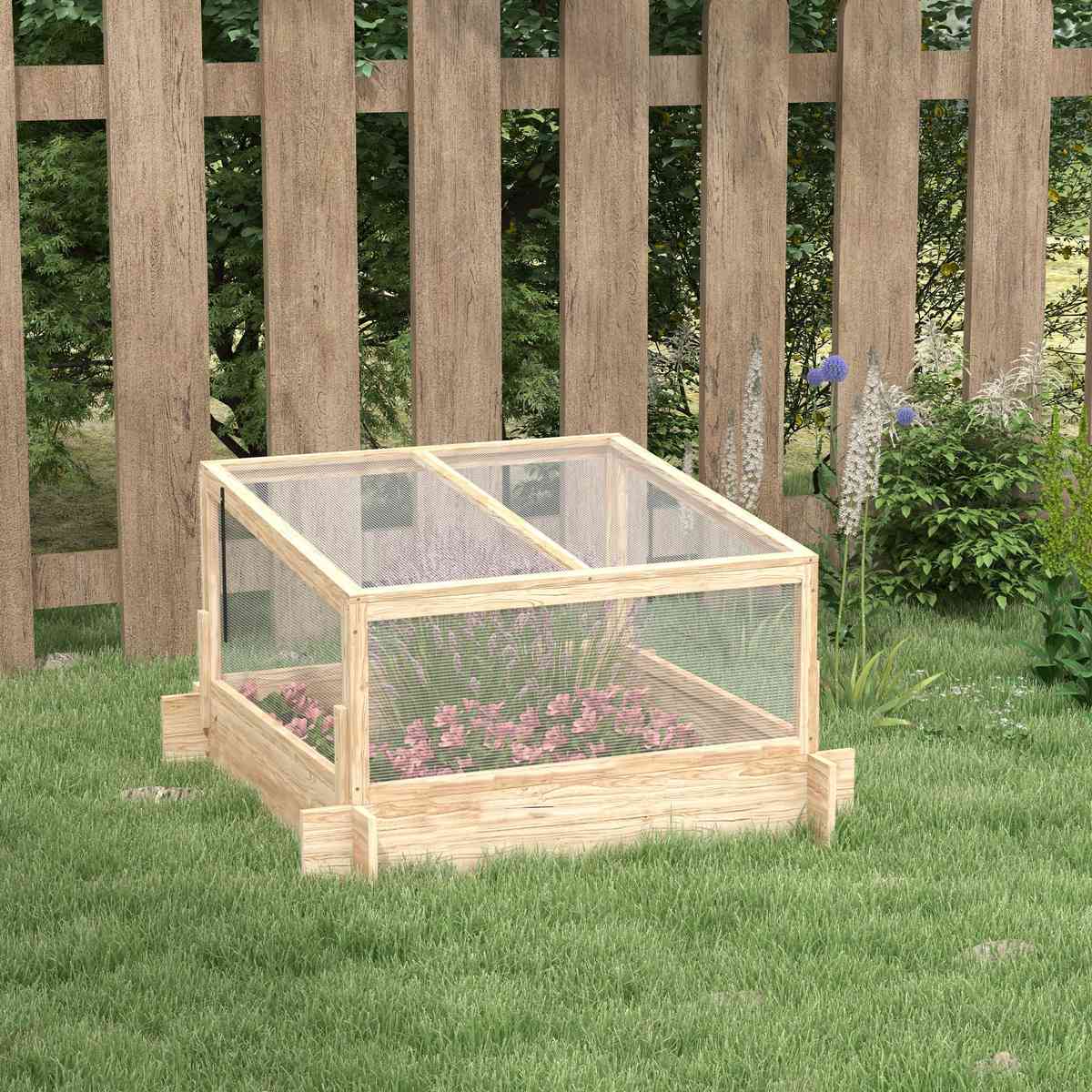 Carré potager couvert en bois avec fleurs près d’une clôture