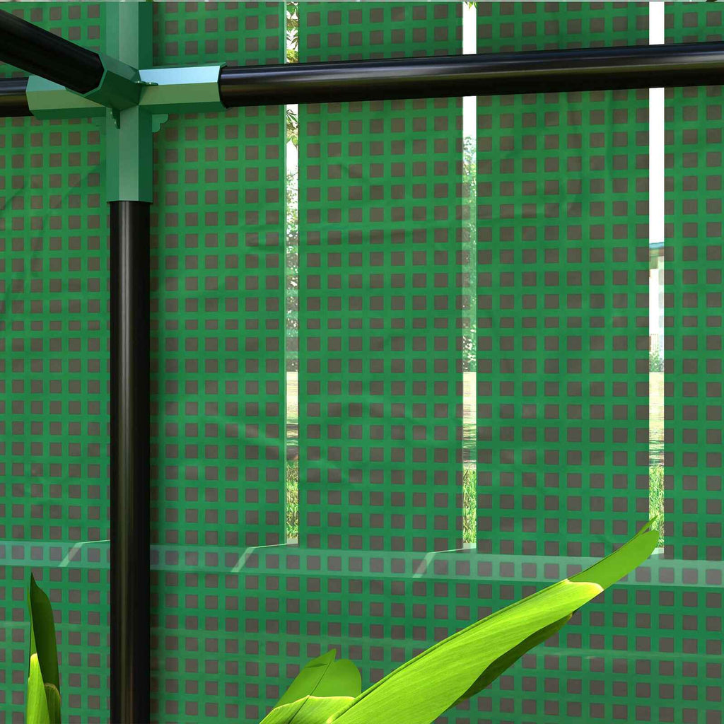 Détail intérieur de l’armature noire et des raccords verts de la mini serre