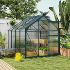 Serre vert foncé au jardin avec plantes et table de culture