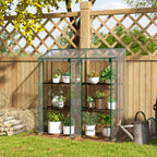 Serre transparente avec plantes devant un treillage
