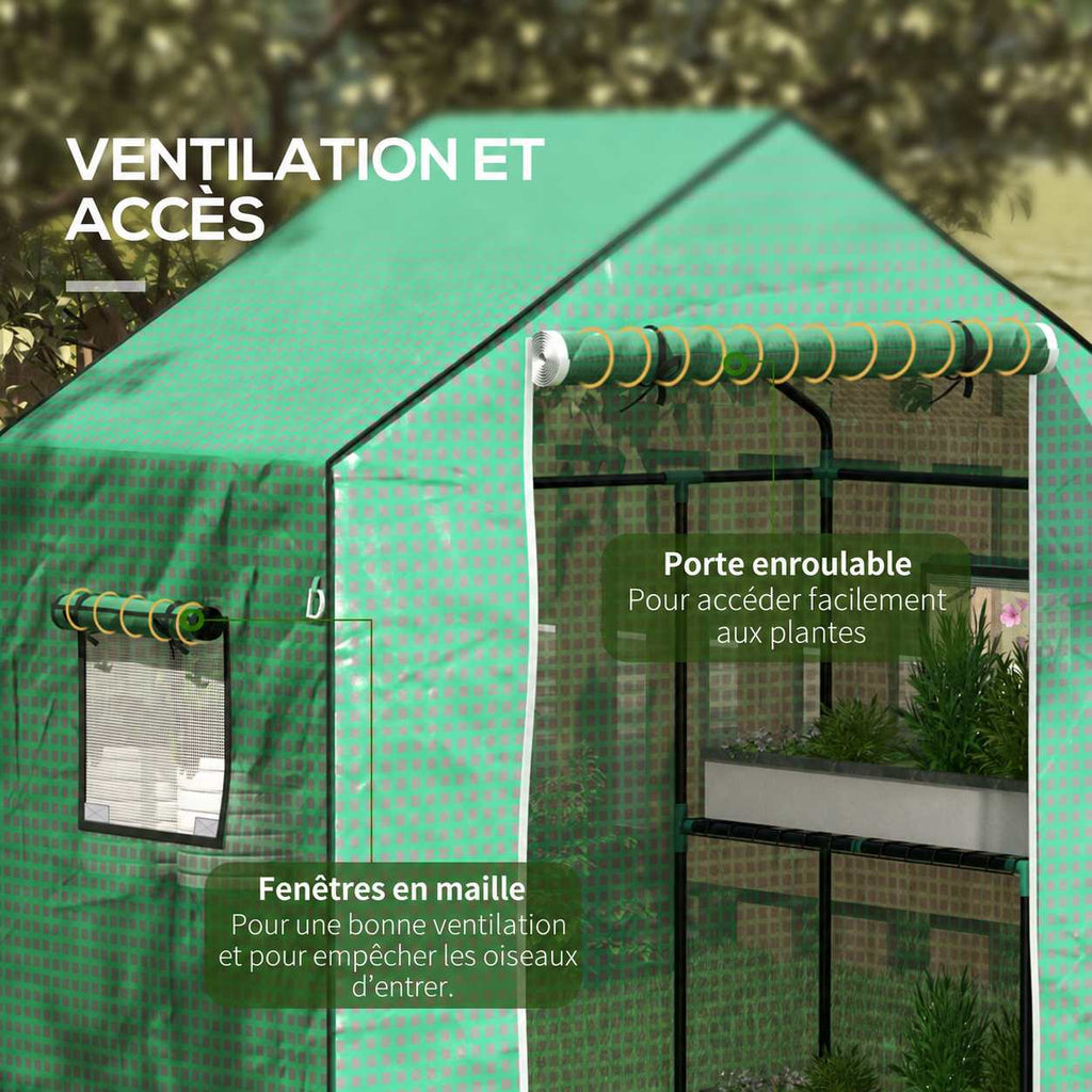 Housse verte avec porte enroulée et fenêtres grillagées