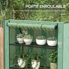 Porte verte enroulée au-dessus des plantes en pots