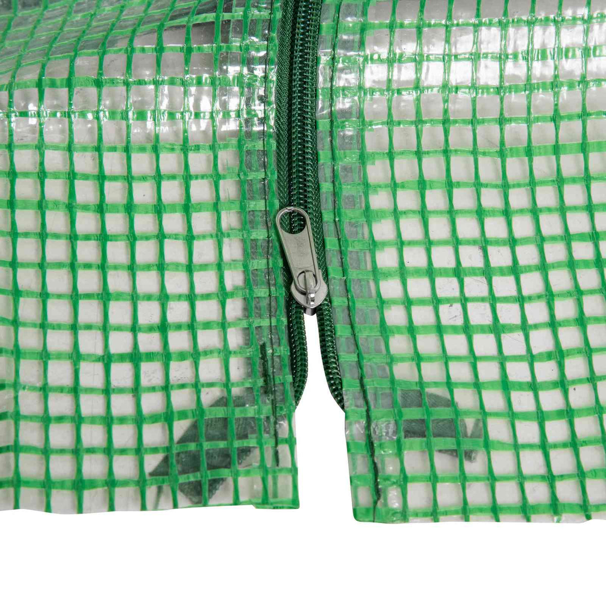 Fermeture zippée sur la bâche verte tramée de la mini-serre