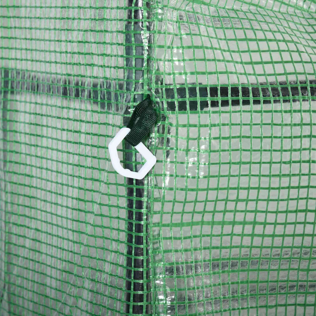 Point d’ancrage avec crochet blanc sur la bâche de la petite serre