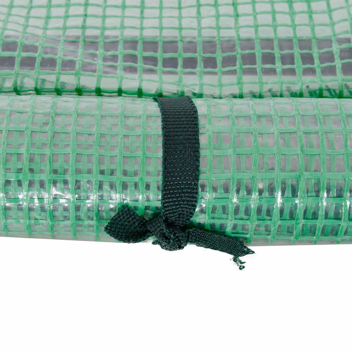 Attache nouée maintenant la porte de la mini-serre verte enroulée