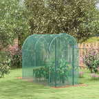 Cage fruitière verte avec plantes sur une pelouse
