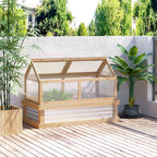 Bac potager couvert en bois et métal sur une terrasse