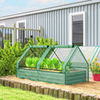 Bac potager couvert vert avec légumes près d’un bâtiment