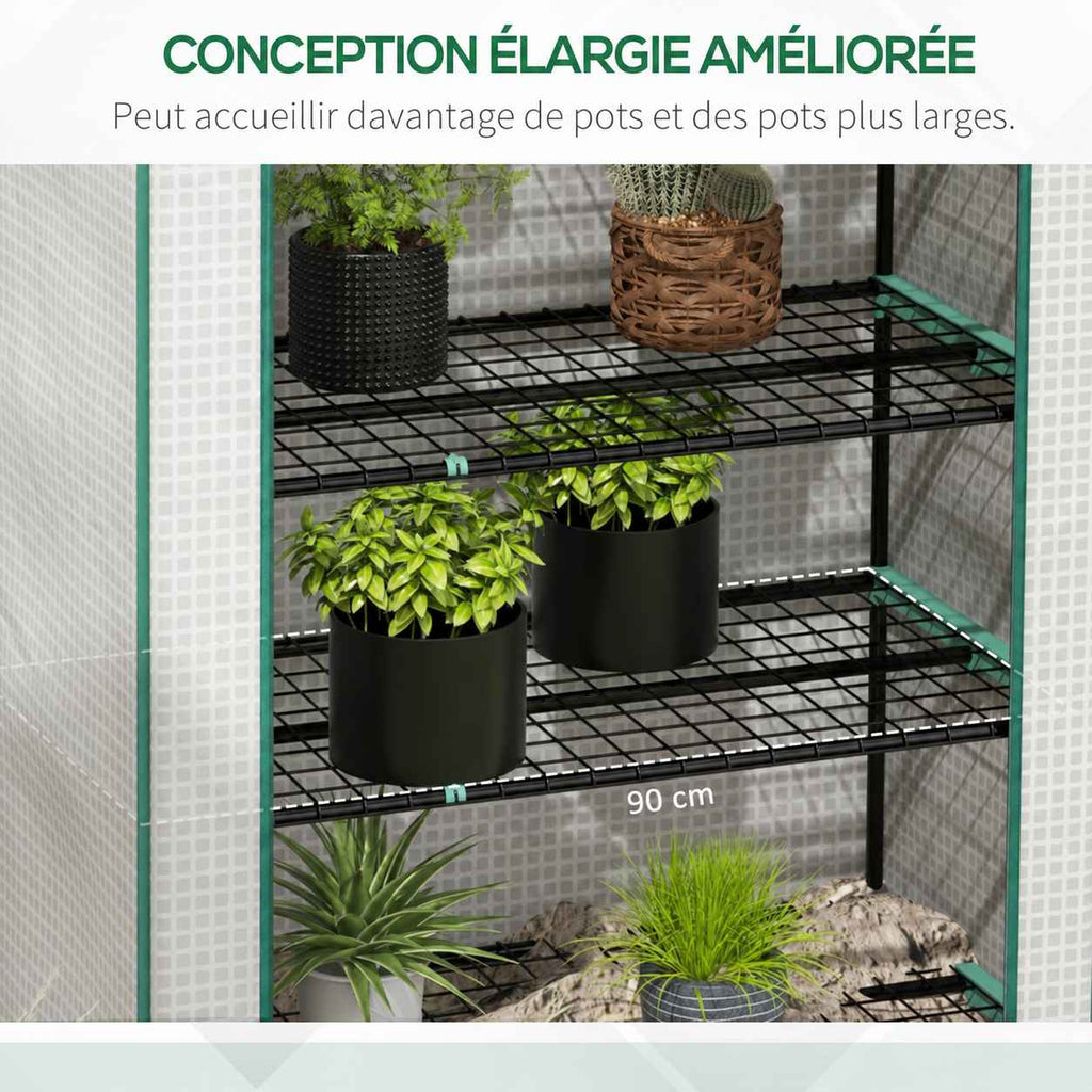 Gros plan des larges tablettes de serre avec plantes