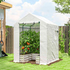 Serre blanche abritant des tomates dans un bac potager au jardin