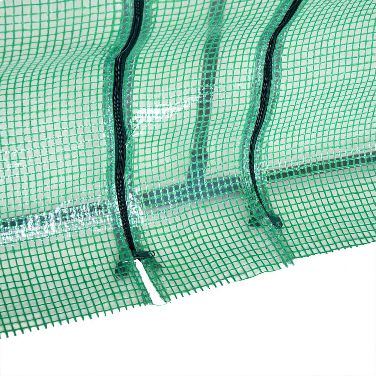 Fermetures zippées sur la bâche verte de la mini-serre
