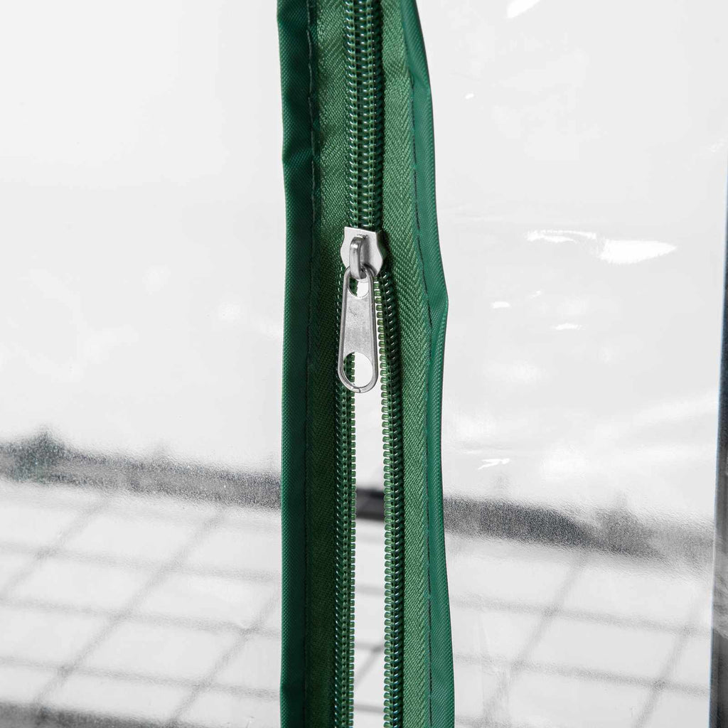 Fermeture zippée verte de la serre de balcon transparente