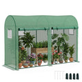 Serre à tomates verte à deux portes ouvertes avec plantes en pots