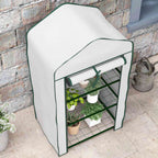 Mini serre blanche avec plantes vue en hauteur