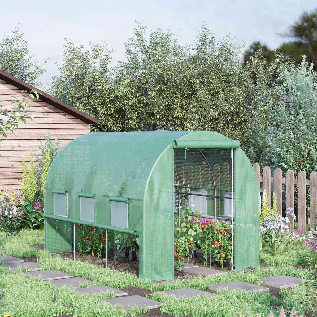 Serre verte avec cultures et côtés relevés au jardin
