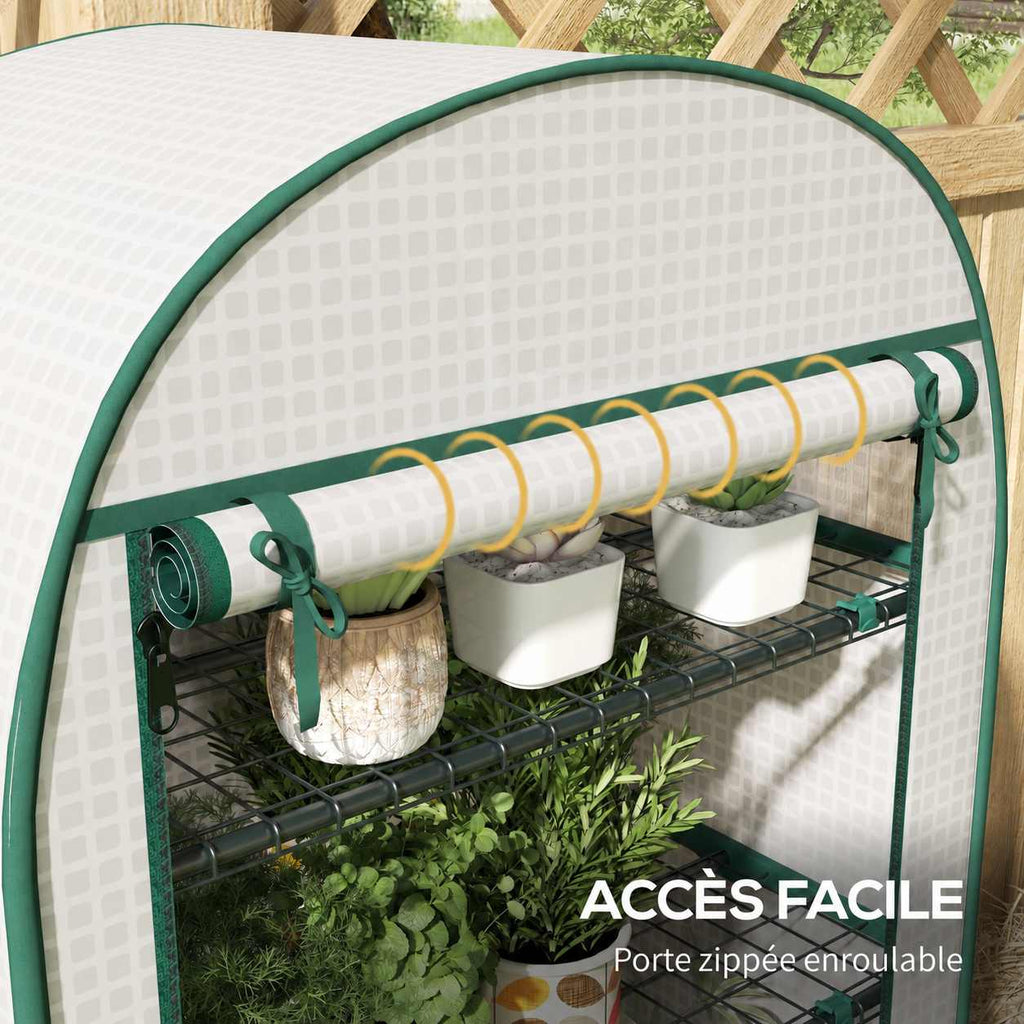 Détail de la porte blanche enroulée au-dessus des plantes