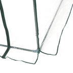Détail du bas de la porte et du cadre de la serre transparente