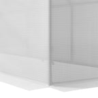 Gros plan sur un angle inférieur de la housse blanche de la mini serre