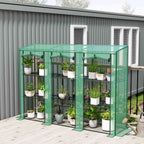 Serre de balcon verte remplie de plantes sur une terrasse
