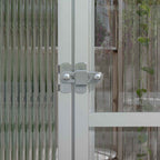 Détail du verrou métallique de la porte de serre