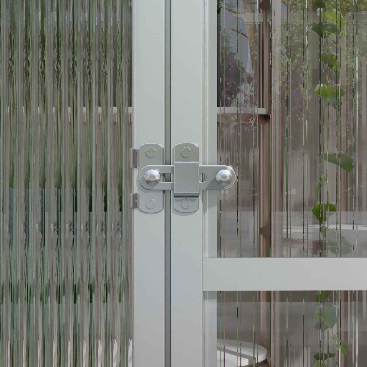 Détail du verrou métallique de la porte de serre