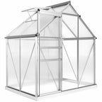Serre argentée en polycarbonate avec porte coulissante et lucarne ouverte