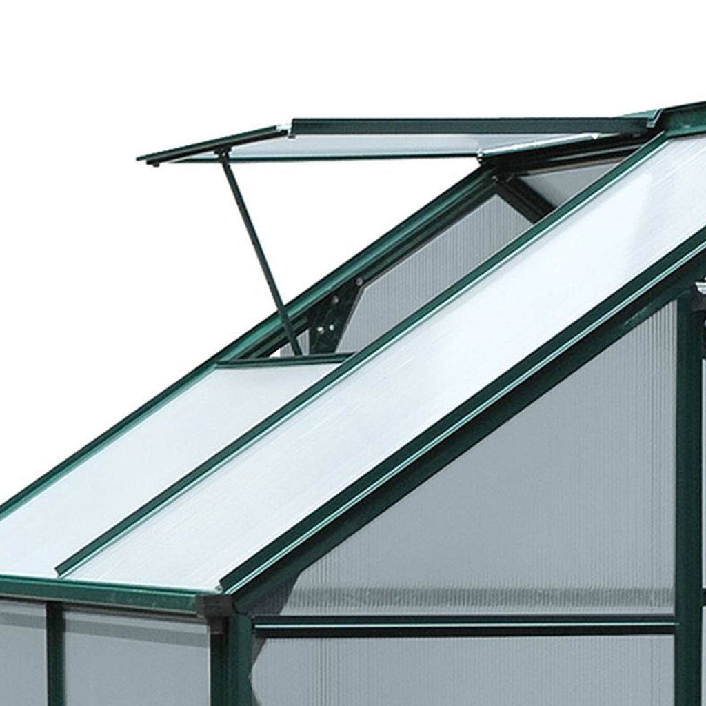 Lucarne ouverte et tige de maintien du toit de la serre verte