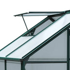 Lucarne ouverte et tige de maintien du toit de la serre verte