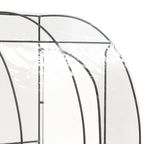 Gros plan sur les arceaux supérieurs et la housse transparente de la serre adossée
