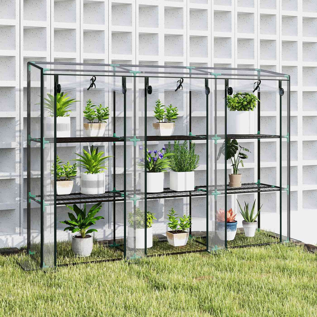 Serre de balcon transparente ouverte avec plantes devant un mur ajouré