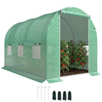 Serre tunnel verte ouverte avec plants de tomates et piquets fournis